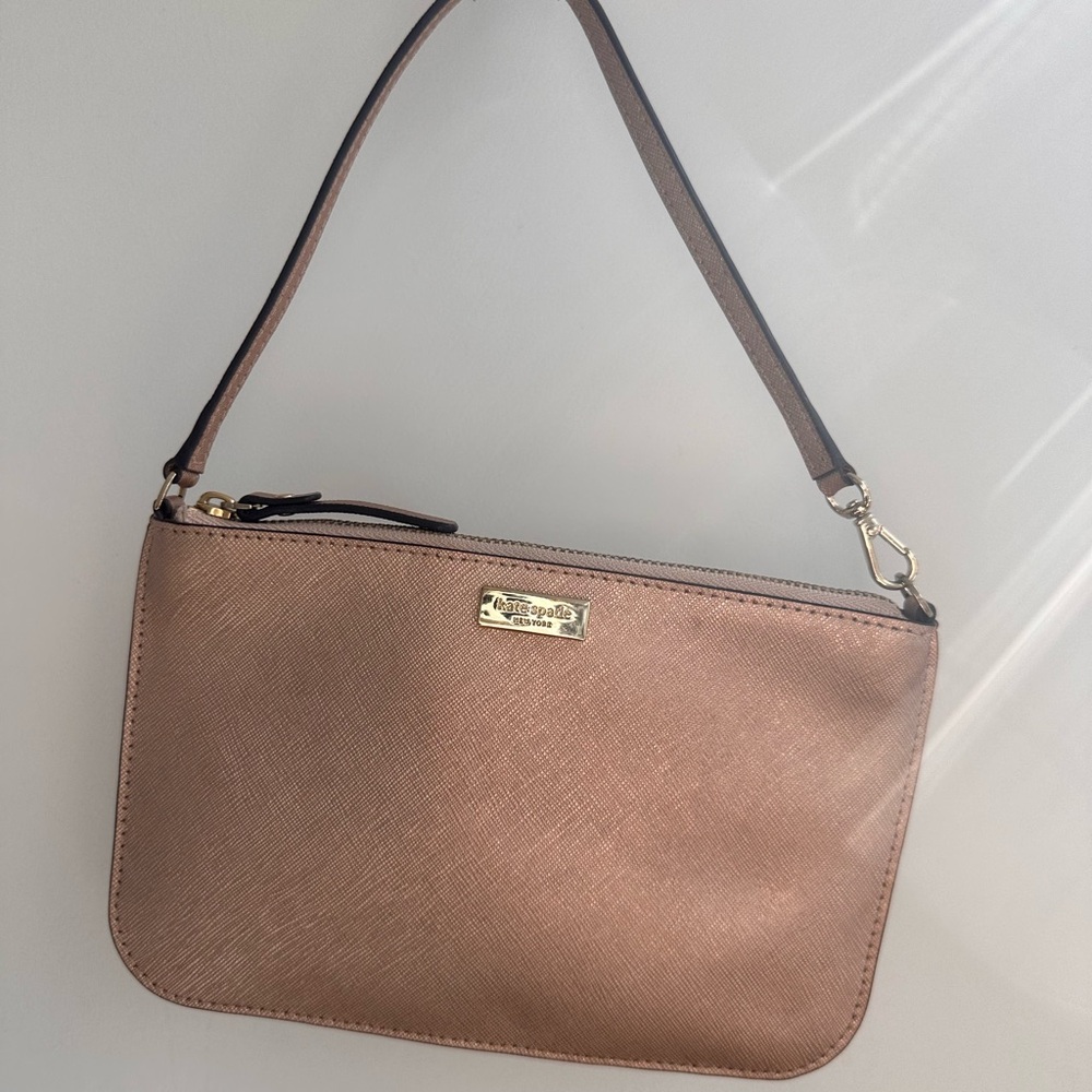 Kate Spade rose gold leather wristlet bag